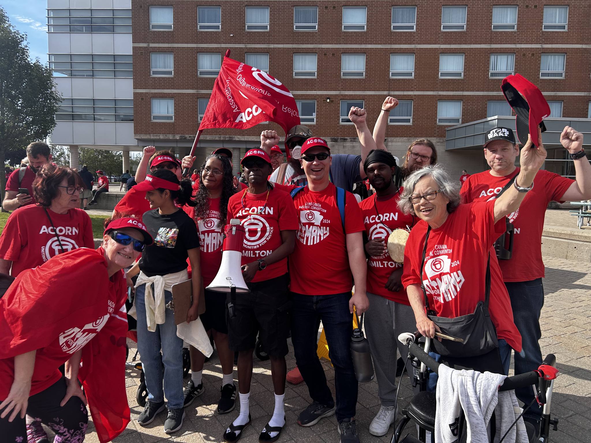 Alex with community members